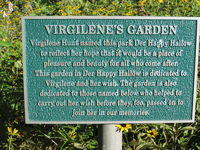 Plaque in garden telling about Virgilene's love of nature